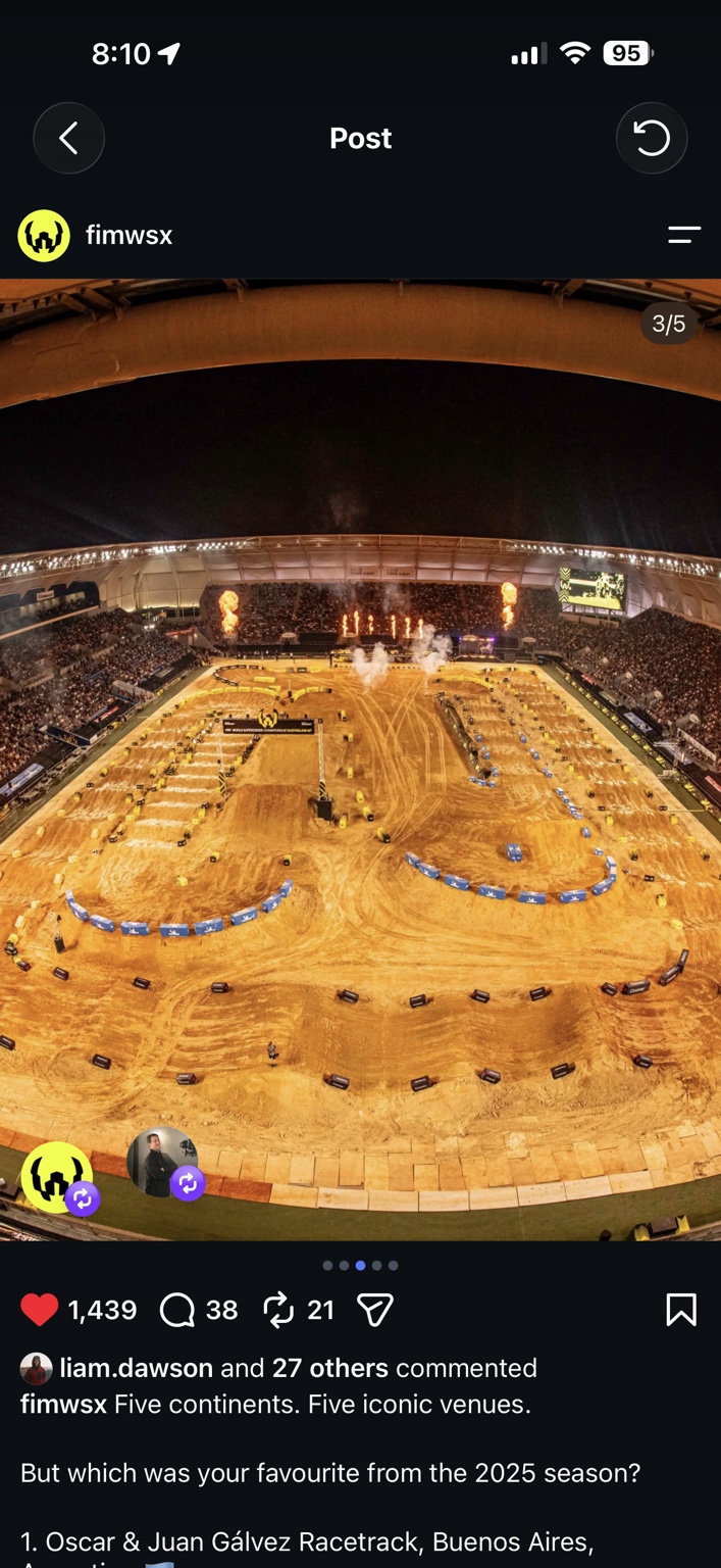 Wide view of a World Supercross track under stadium lights